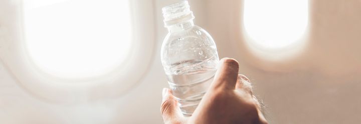 drinking water on plane