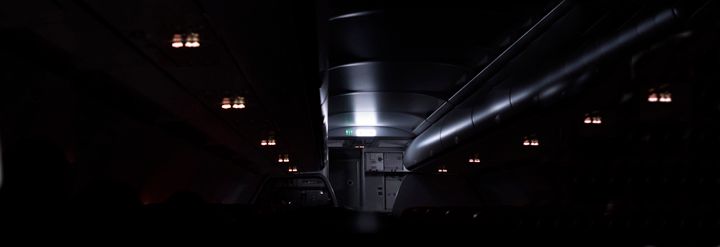 dimmed lights on plane